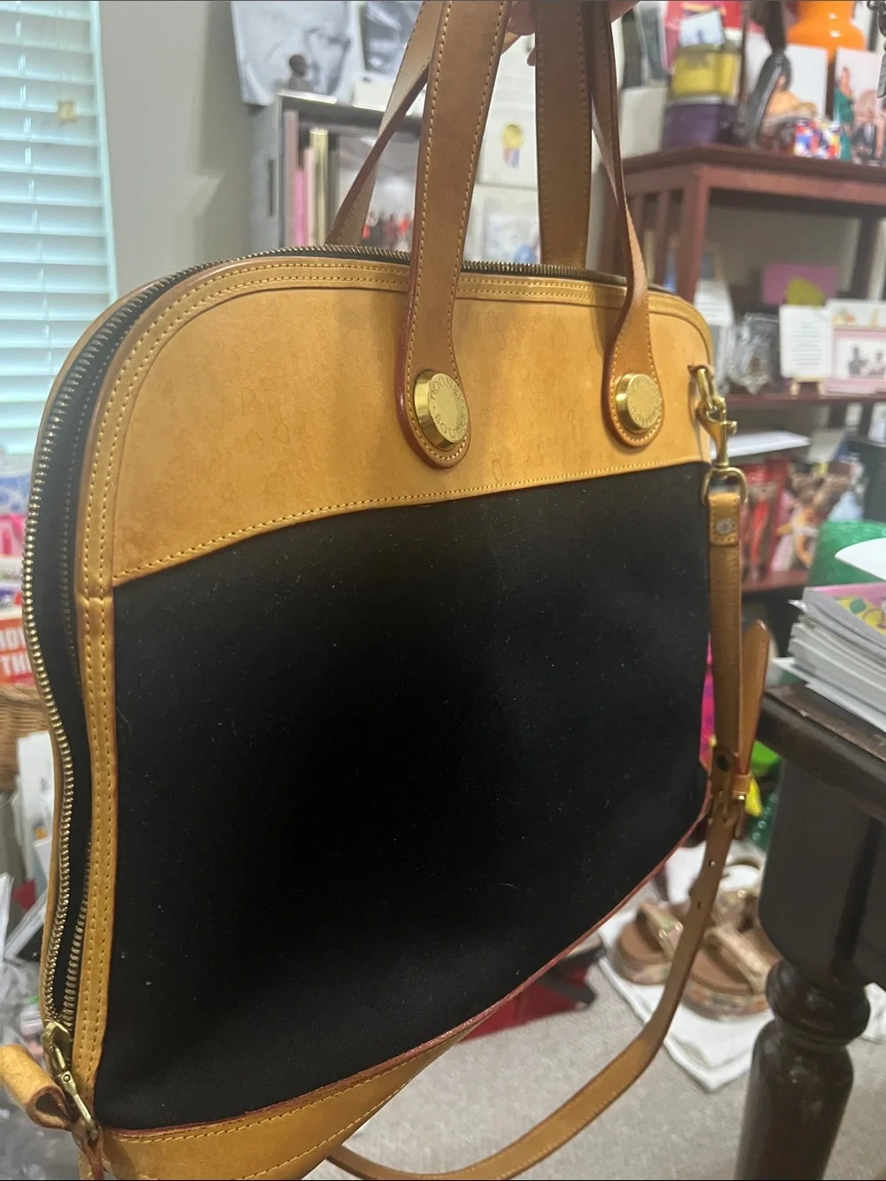 Dooney & Bourke Black and Tan Satchel with Gold Hardware